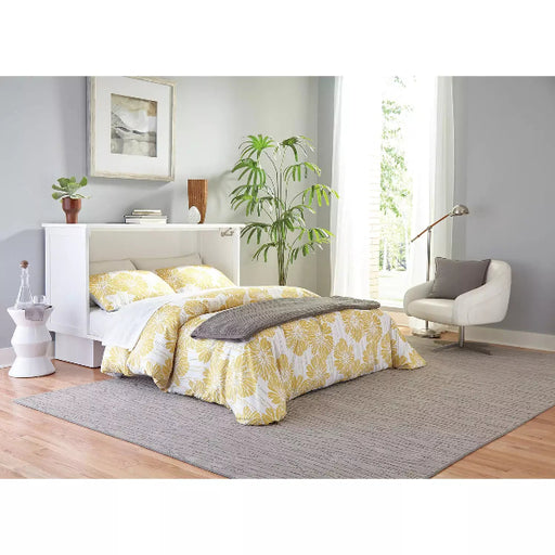 murphy bed white cabinet in white placed in the room