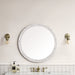 James Martin Callie 30" Round Mirror in White Mother of Pearl, shown in a bathroom setting