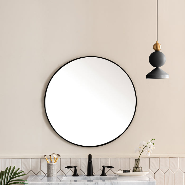 James Martin Rohe 30" Round Mirror in Matte Black, shown in a bathroom setting