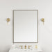 James Martin Rohe 30" Rectangular Mirror in Champagne Brass, shown in a bathroom setting