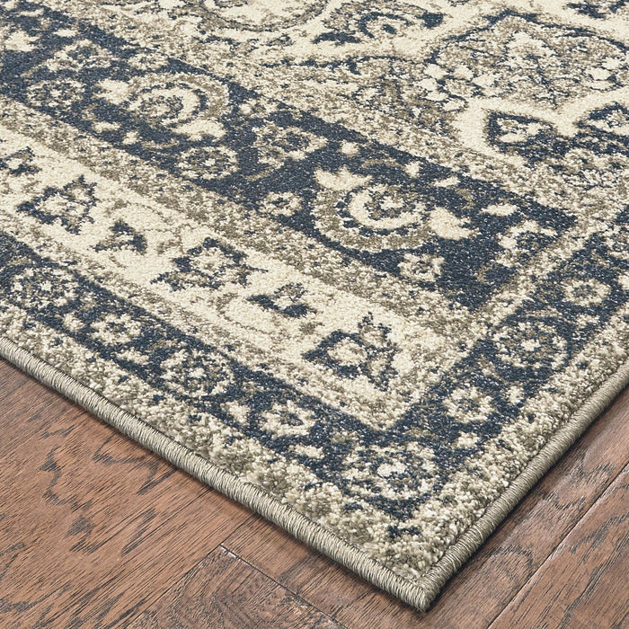 Oriental Weavers Richmond 5504I Ivory/ Navy 6'7"" x 9'6"" Indoor Area Rug R5504I200290ST