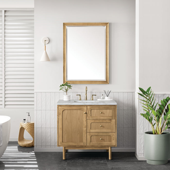James Martin Laurent 36" Single Bathroom Vanity in Light Natural Oak, shown in a bathroom setting
