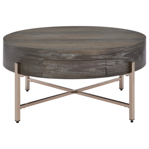 Benzara 1 Drawer Round Modern Coffee Table With Crossed Metal Legs, Brown And Gold BM215037